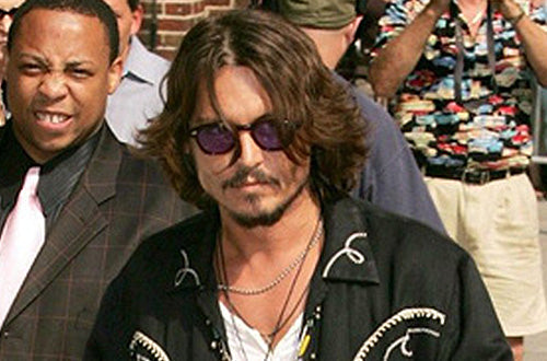 Johnny Depp wearing a vintage Rockmount bolero jacket